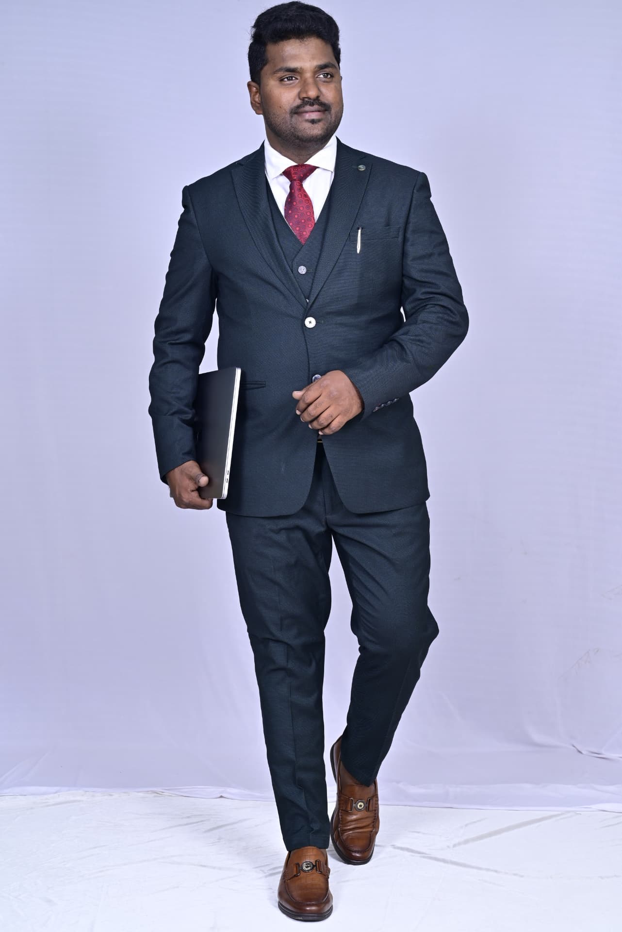 Dr. Ramesh, founder of Daffodils English Training Academy, on the academy portfolio cover